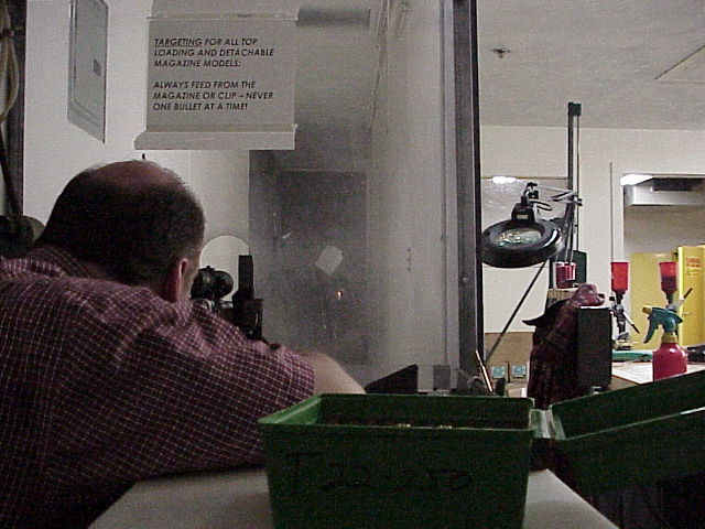 A look down the indoor range.  Note the small light in the middle of the picture which lights up the target positioned at 100 yards.