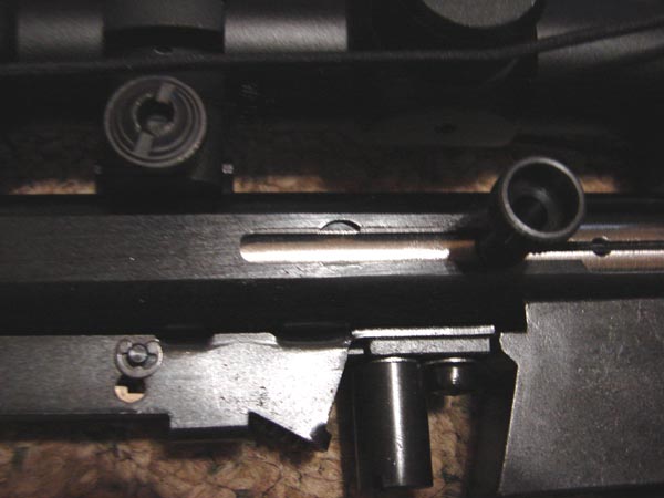 Close-up of the bolt hold-open relief cut and charging handle.