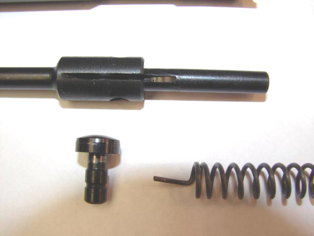 Close-up of the cocking piece, firing pin spring and tail of the firing pin.